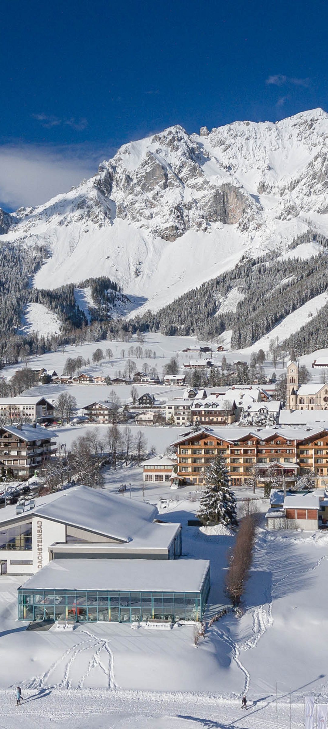 Aerial view of Hotel Matschner with Dachsteinbad in winter