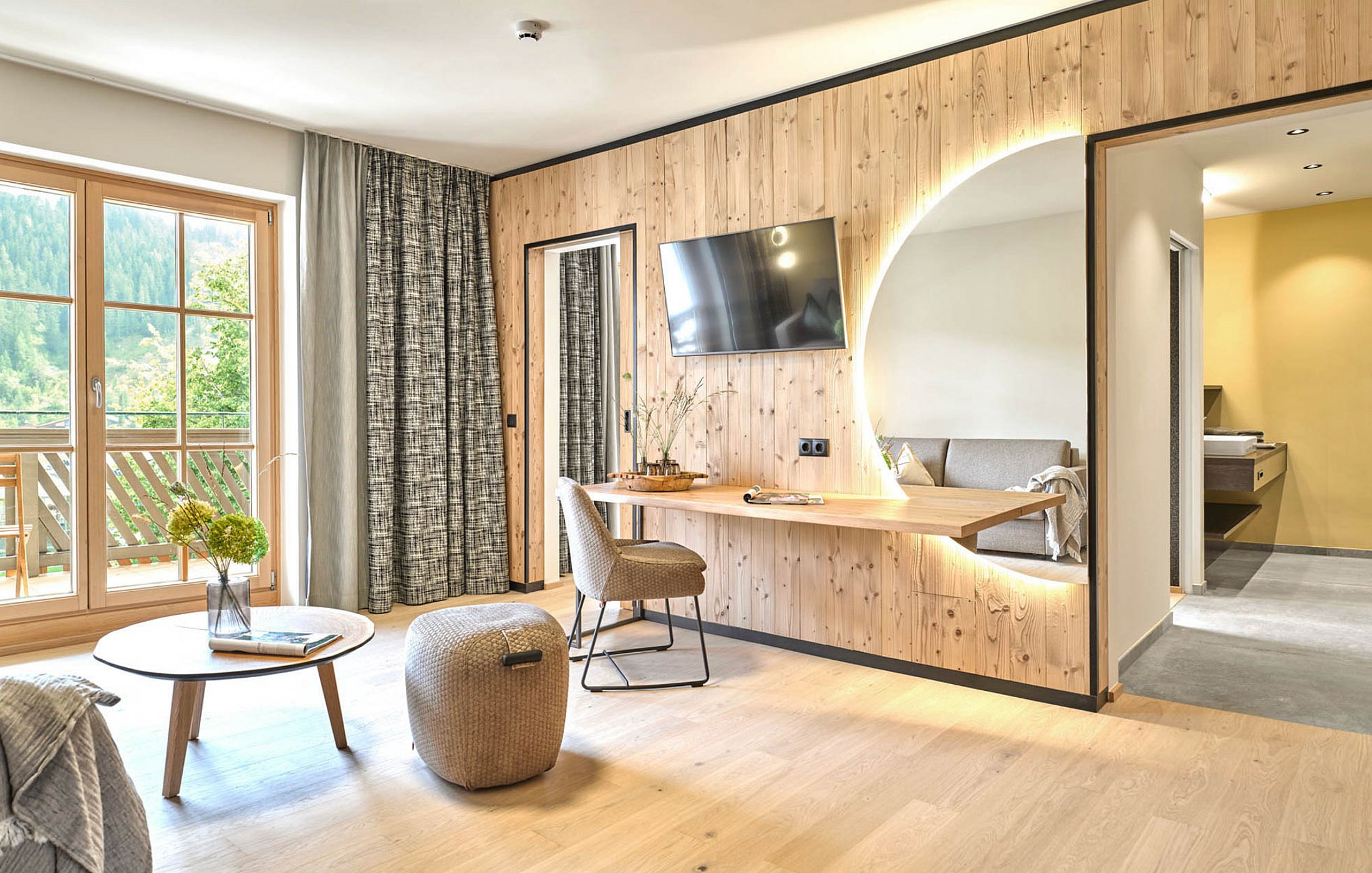 Living area with balcony in the Deluxe South room
